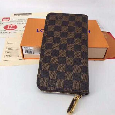 louis vuitton multiple wallet damier ebene brown|louis vuitton artsy damier ebene.